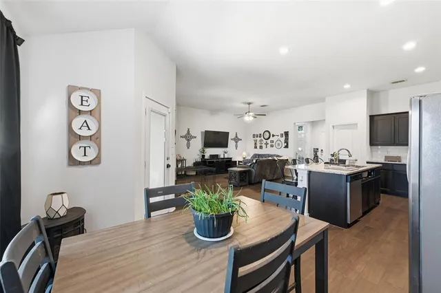 a kitchen with a stove oven and cabinets