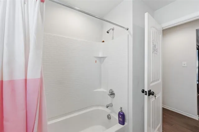 a view of kitchen with furniture and wooden floor