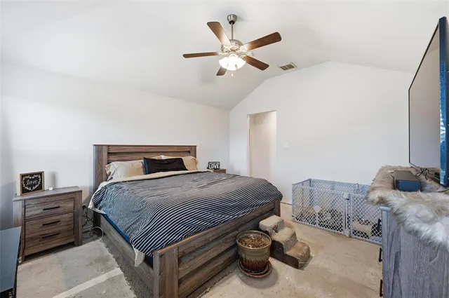 a kitchen with a refrigerator and a stove