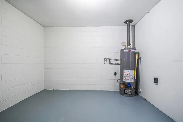 a view of storage and utility room with washer and dryer
