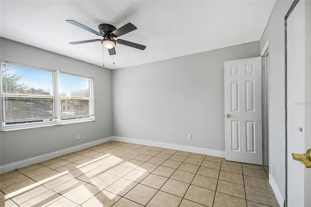 a view of an empty room and window