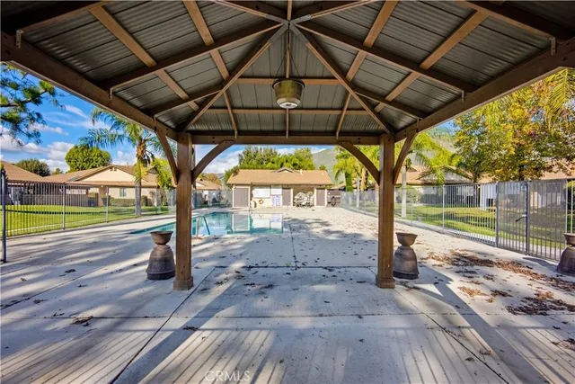a view of a street with a big yard