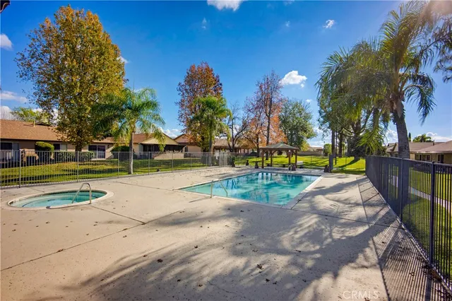a view of a park with large trees