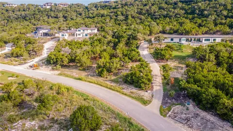 a view of a city with an ocean