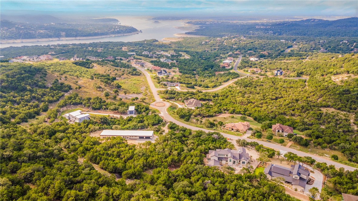 9408 Ranchland Hills Boulevard Jonestown, TX 78645 - Photo 4 of 23 a view of a city with an ocean