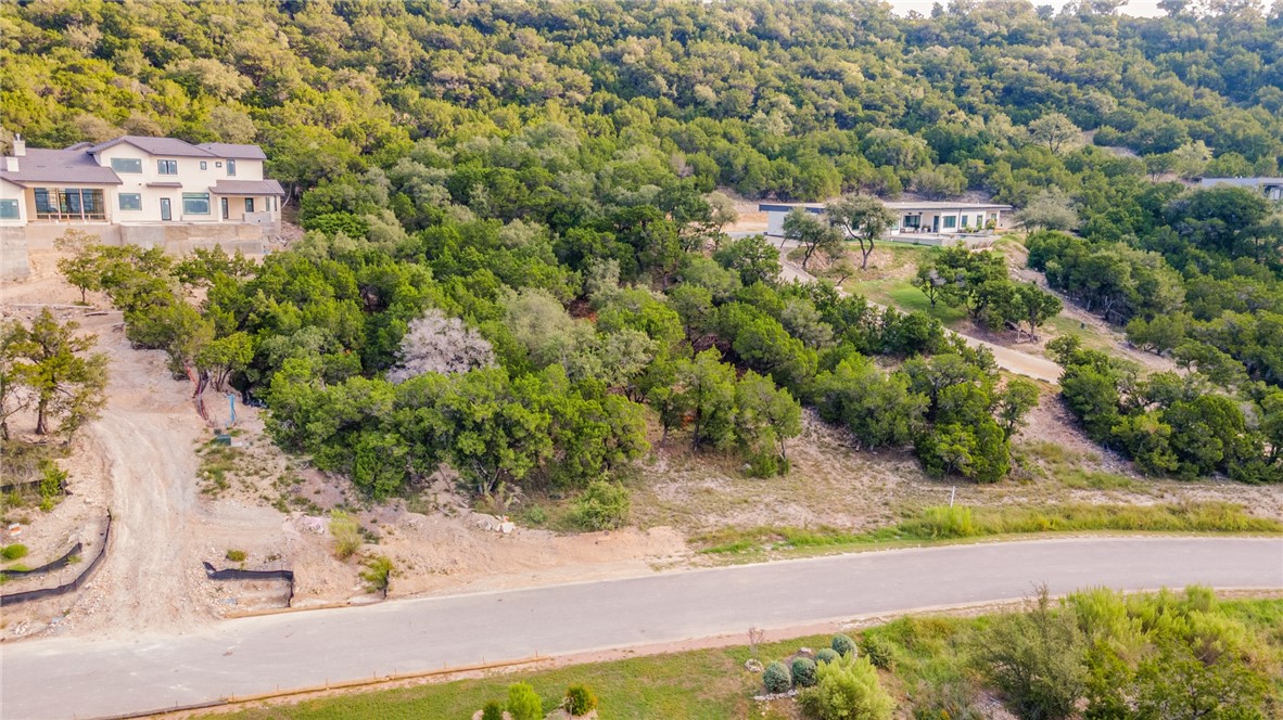 9408 Ranchland Hills Boulevard Jonestown, TX 78645 - Photo 8 of 23 an aerial view of a house with yard