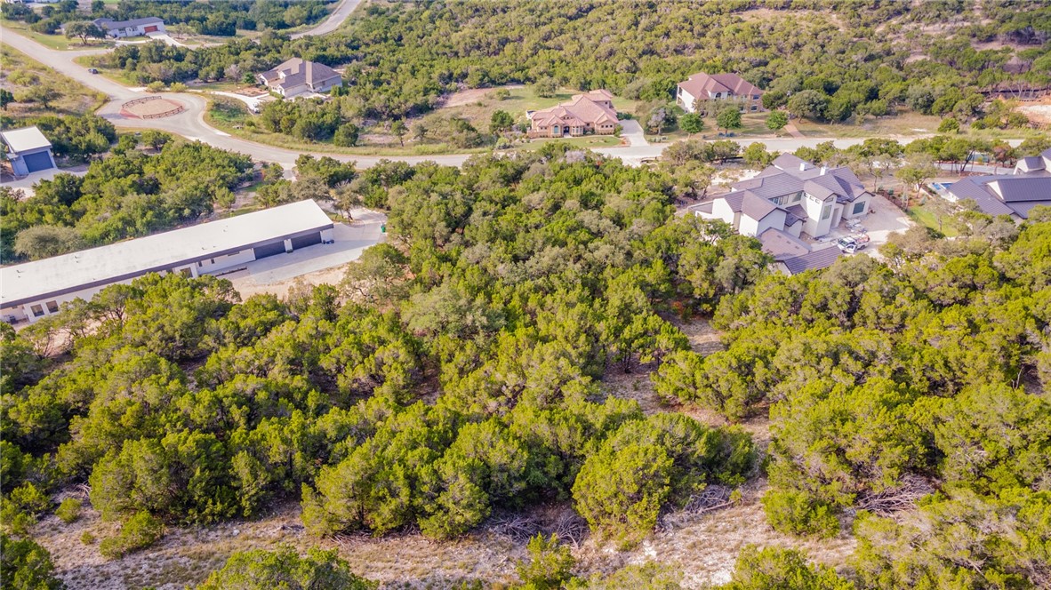 9408 Ranchland Hills Boulevard Jonestown, TX 78645 - Photo 10 of 23 a view of a yard