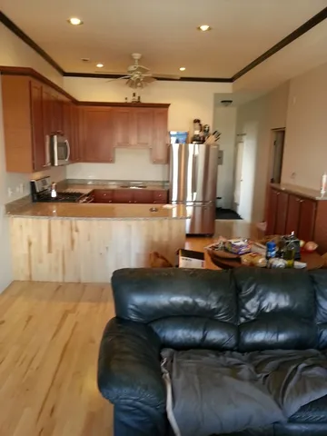 a room with furniture and a flat screen tv