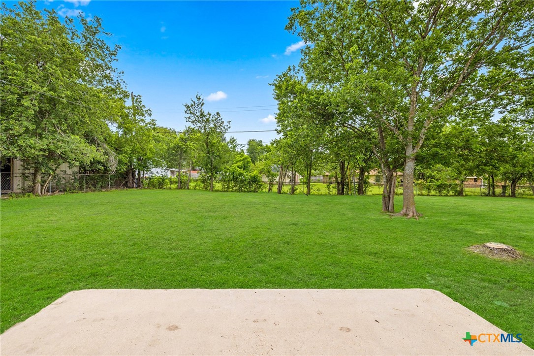 1609 Linwood Road Temple, TX 76502 - Photo 19 of 25 a view of grassy field with benches