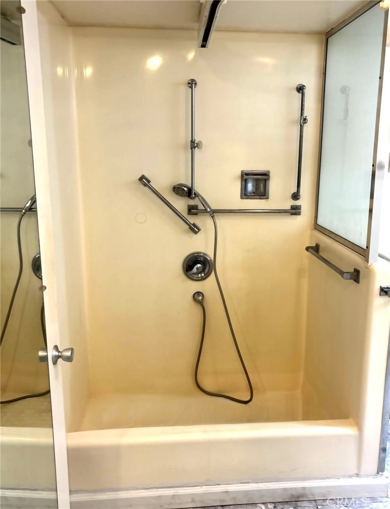 1075 Brookline Road, Unit M9220E Seal Beach, CA 90740 - Photo 16 of 16 a bathroom with a shower
