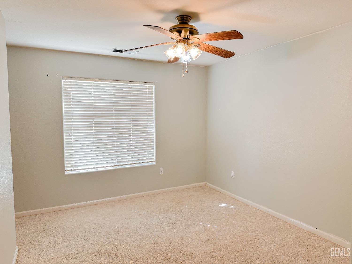 Undisclosed Address Bakersfield, CA 93312 - Photo 23 of 32 a view of an empty room with a window