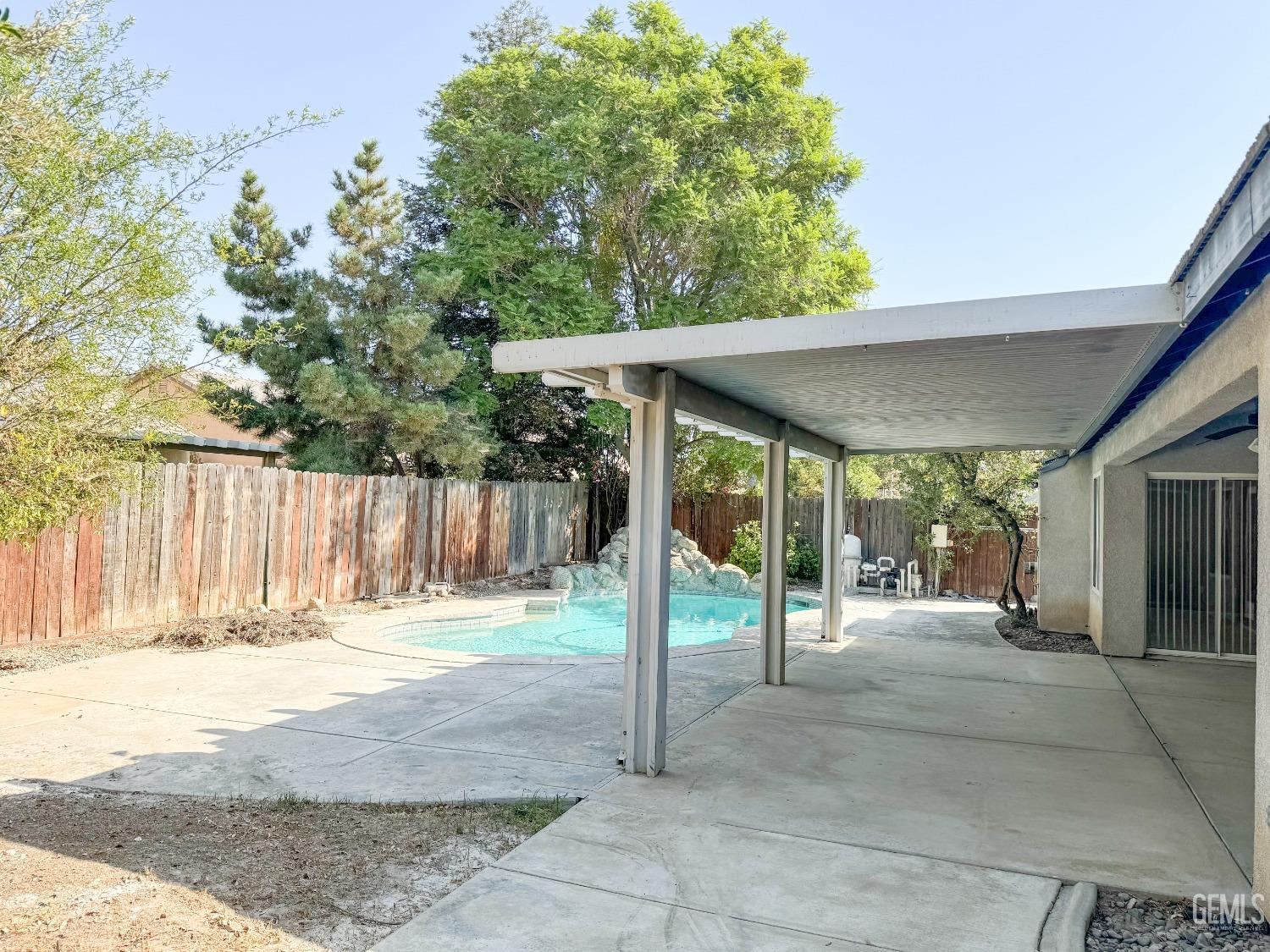 Undisclosed Address Bakersfield, CA 93312 - Photo 27 of 32 a patio with a yard