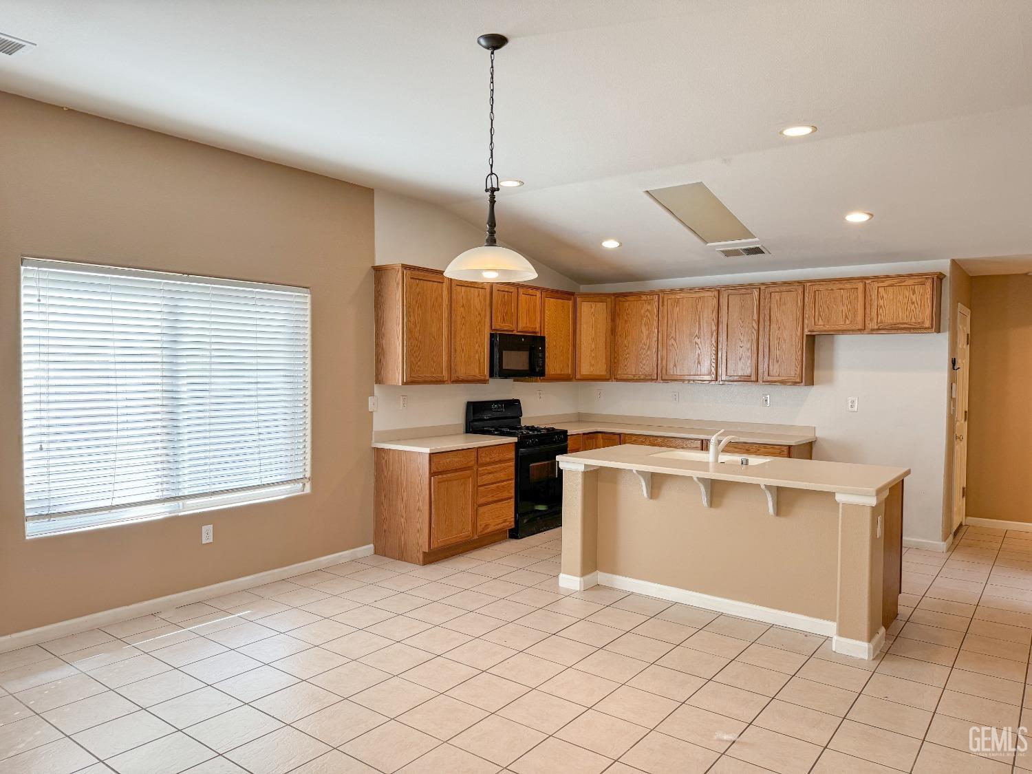 Undisclosed Address Bakersfield, CA 93312 - Photo 3 of 32 a kitchen with a stove a sink dishwasher and a refrigerator