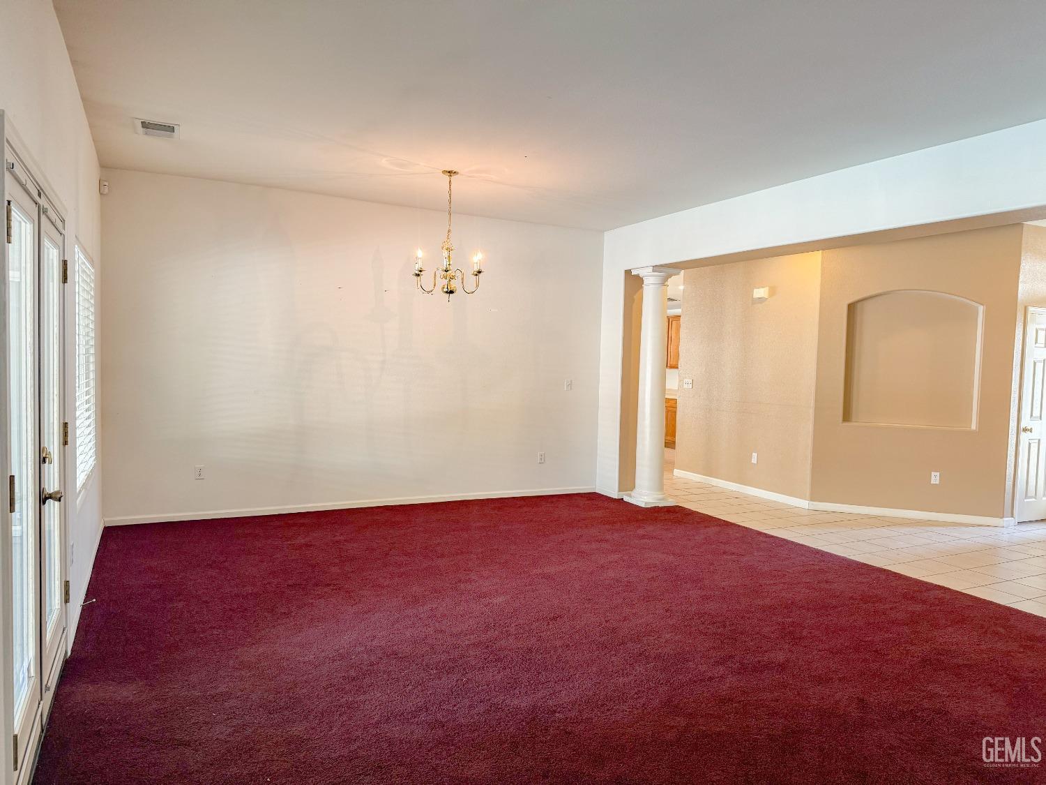 Undisclosed Address Bakersfield, CA 93312 - Photo 10 of 32 wooden floor in an empty room with a window