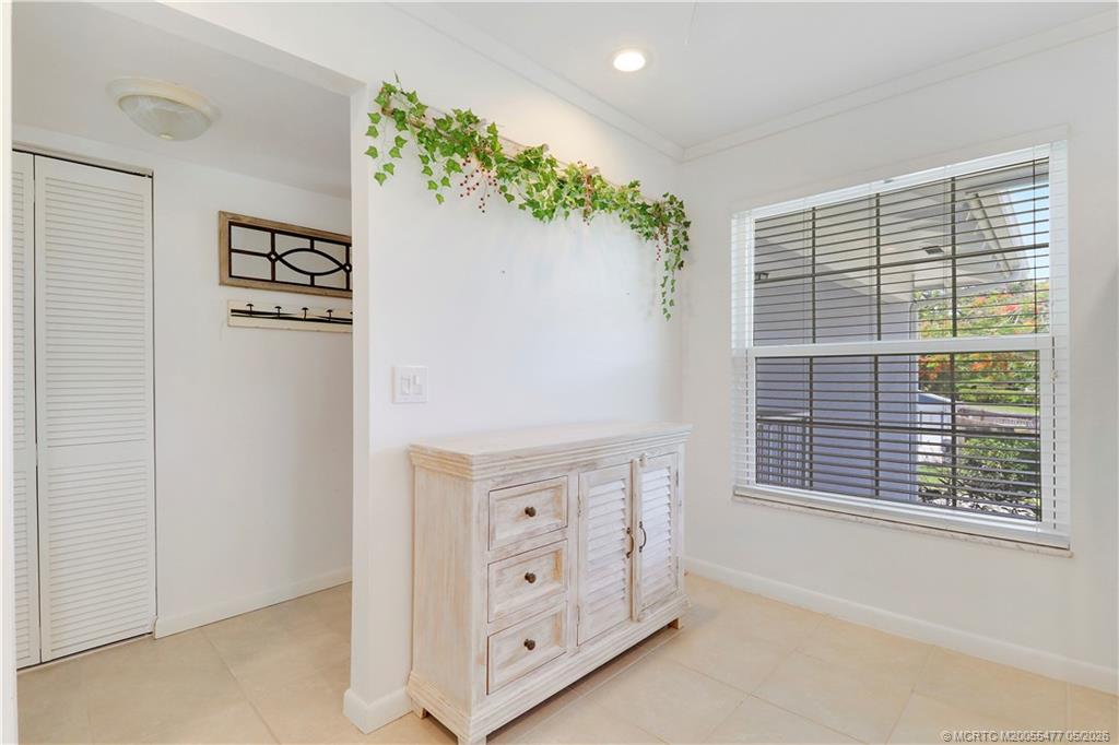 1852 Southwest Palm City Road, Unit 201 Stuart, FL 34994 - Photo 14 of 34 a view of an empty room with a window