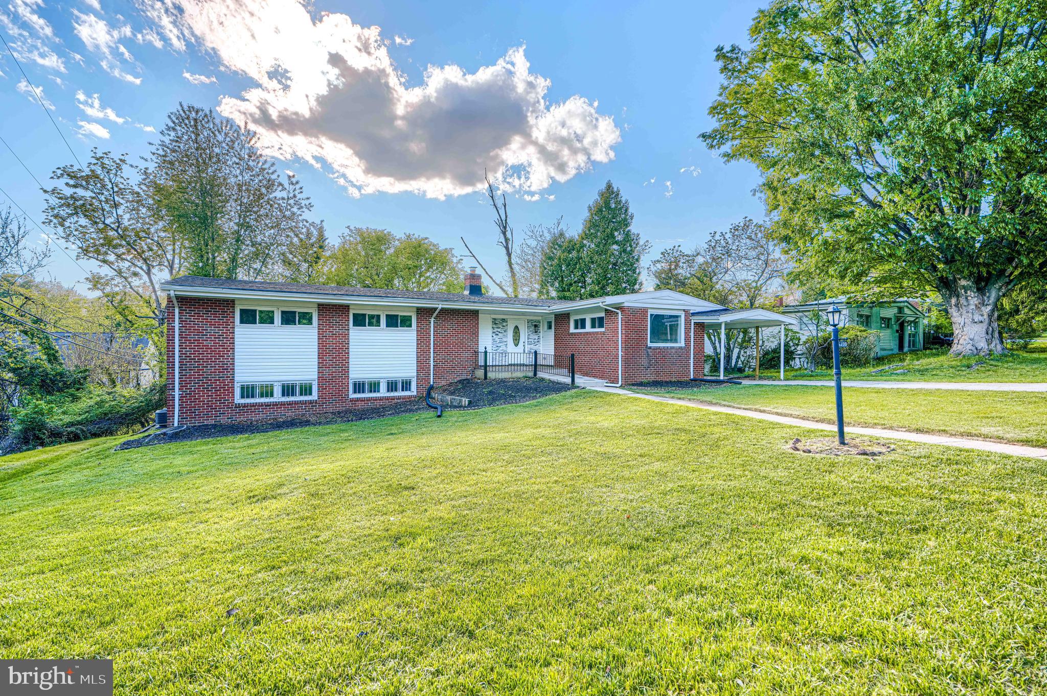6200 Ivymount Road Baltimore, MD 21209 - Photo 5 of 71 a view of a house with a backyard