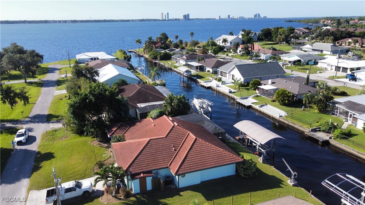 1823 Stevenson Road North Fort Myers, FL 33917 - Photo 2 of 32 an aerial view of a house with garden space and street view