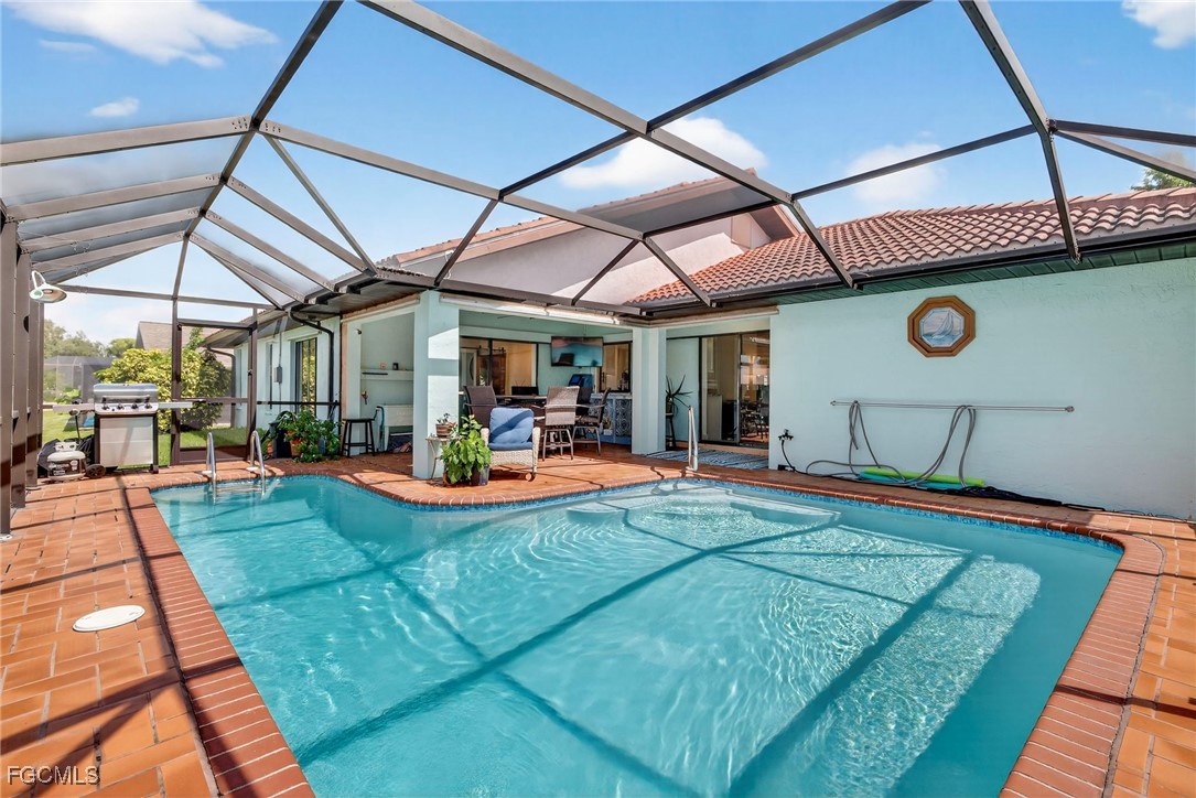 1823 Stevenson Road North Fort Myers, FL 33917 - Photo 27 of 32 a view of swimming pool with a patio