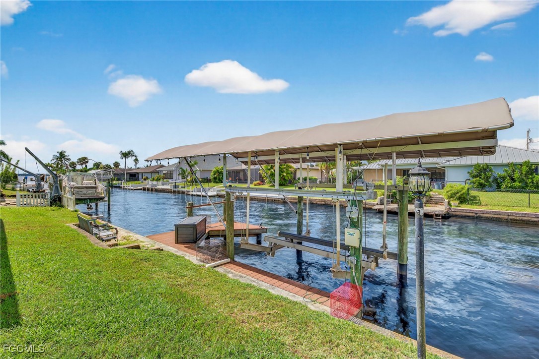 1823 Stevenson Road North Fort Myers, FL 33917 - Photo 31 of 32 a view of a swimming pool with a patio