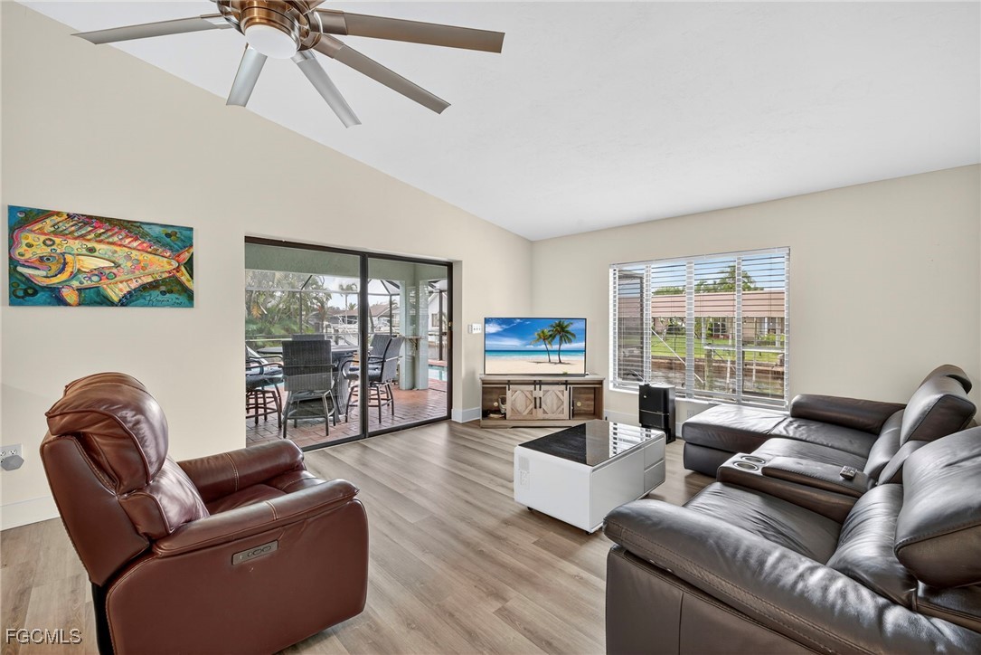 1823 Stevenson Road North Fort Myers, FL 33917 - Photo 10 of 32 a living room with furniture and a flat screen tv
