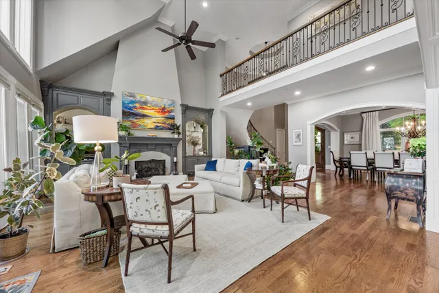 a spacious bedroom with a bed and a flat screen tv