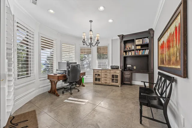 a view of a lake with houses in the back