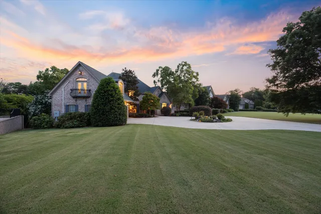 a living room with fireplace furniture a fireplace and a flat screen tv