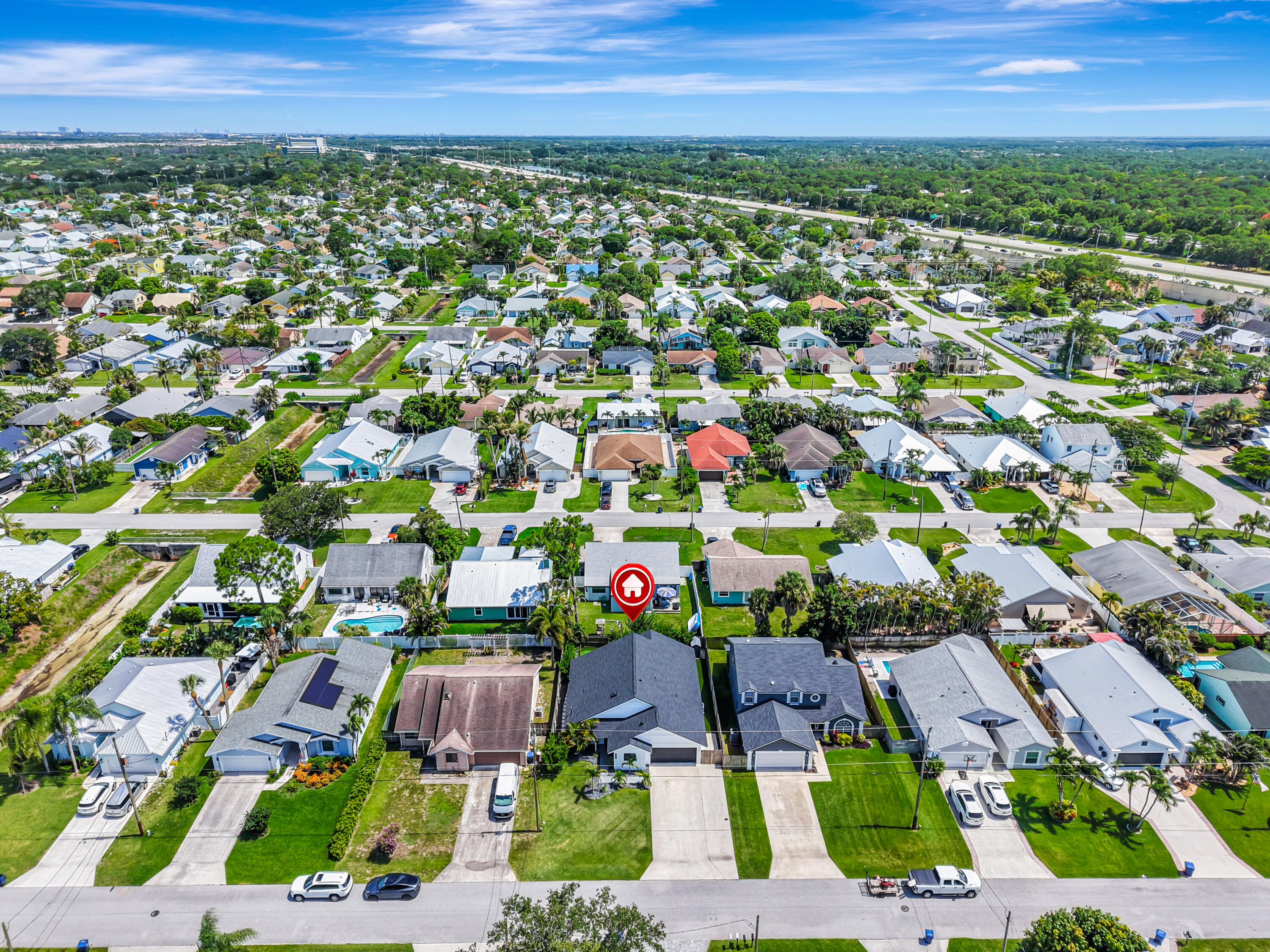 6312 Michael Street Jupiter, FL 33458 - Photo 59 of 66 DJI_20260608150900_0218_D