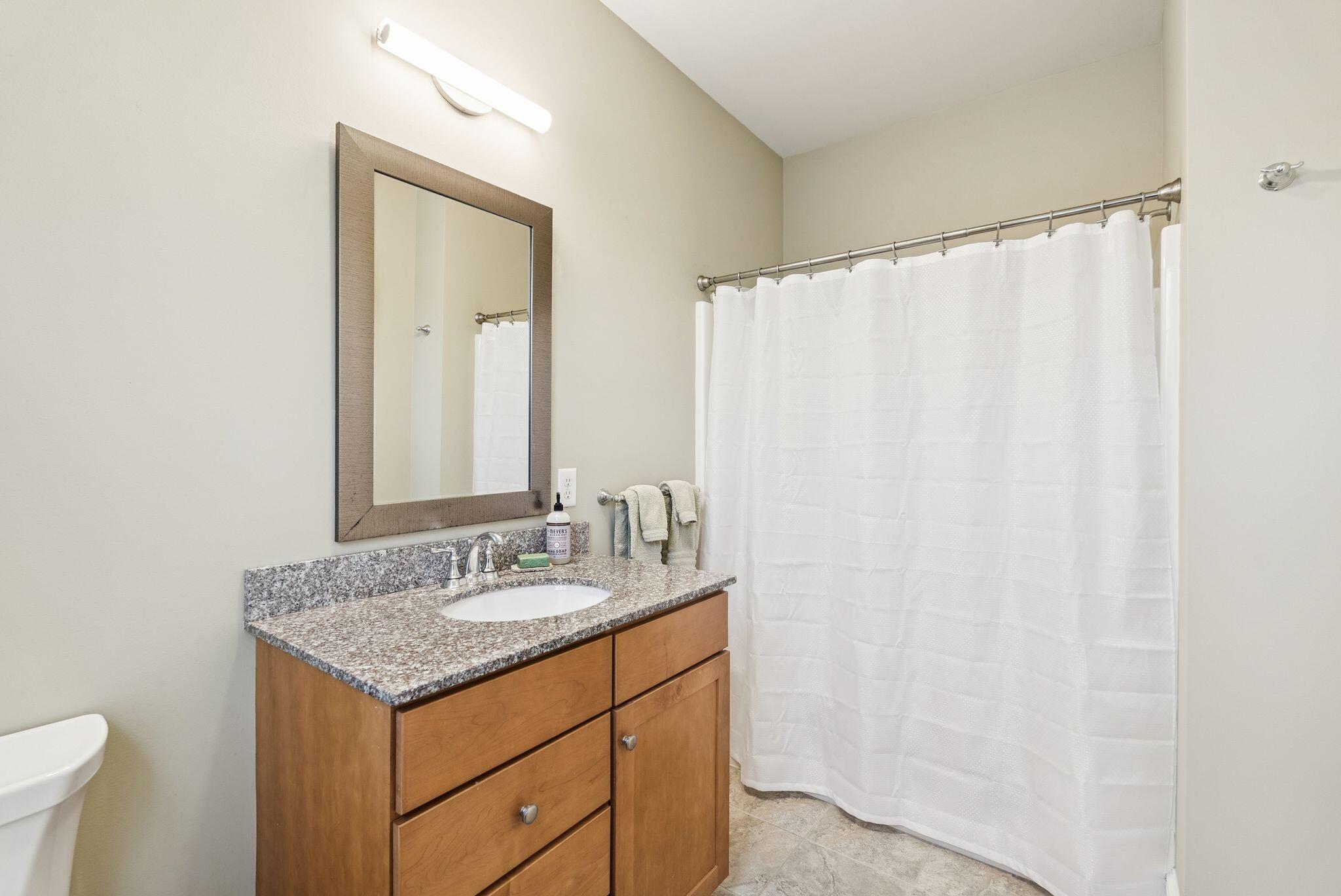 12 Inspiration Drive, Unit 12 Scarborough, ME 04074 - Photo 40 of 72 Guest bedroom ensuite bathroom