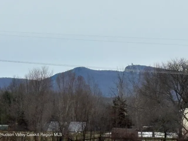 a view of a dry yard with an outdoor space