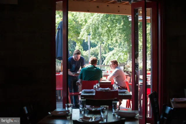 a view of a street with a building in the background