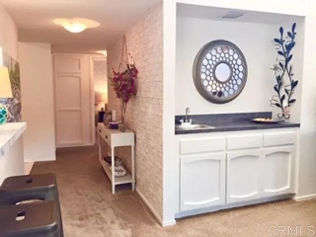 a view of a livingroom with furniture