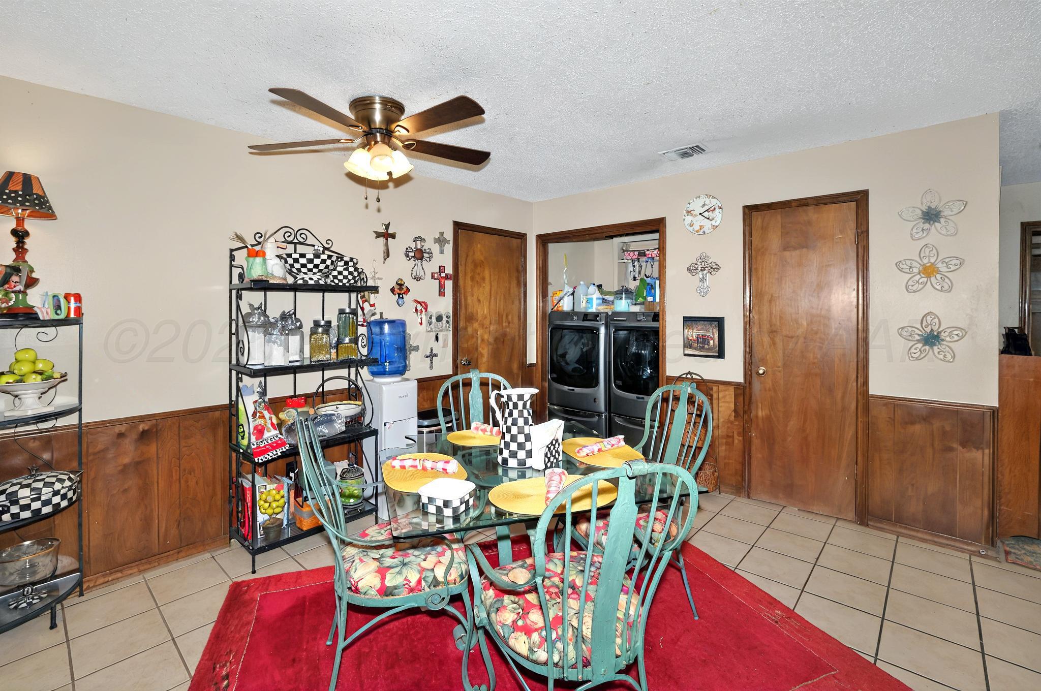 6225-6227 Belpree Road Amarillo, TX 79106 - Photo 23 of 31 a view of a dining room with furniture