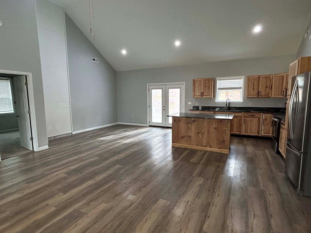 Undisclosed Address Hayesville, NC 28904 - Photo 4 of 11 a large kitchen with cabinets wooden floor and stainless steel appliances