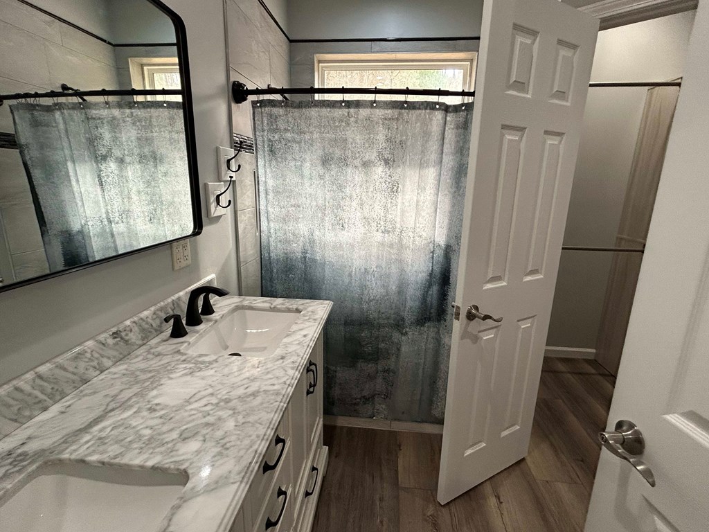 Undisclosed Address Hayesville, NC 28904 - Photo 5 of 11 a bathroom with a sink and shower