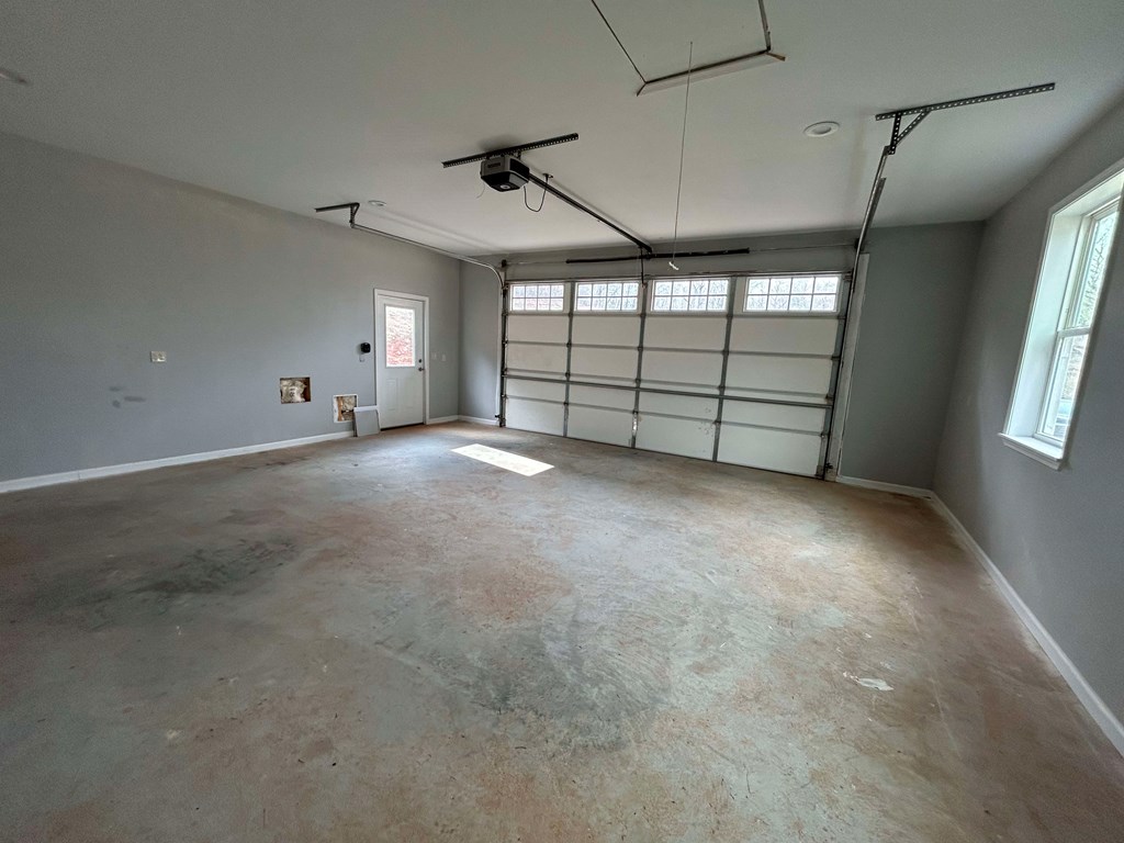 Undisclosed Address Hayesville, NC 28904 - Photo 10 of 11 an empty room with windows and fan