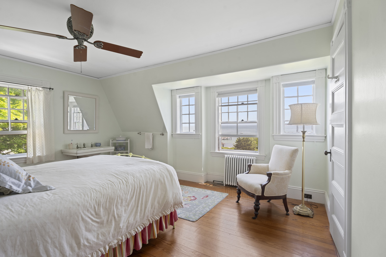33 Goethals Way Vineyard Haven, MA 02568 - Photo 23 of 34 a bedroom with a bed and wooden floor