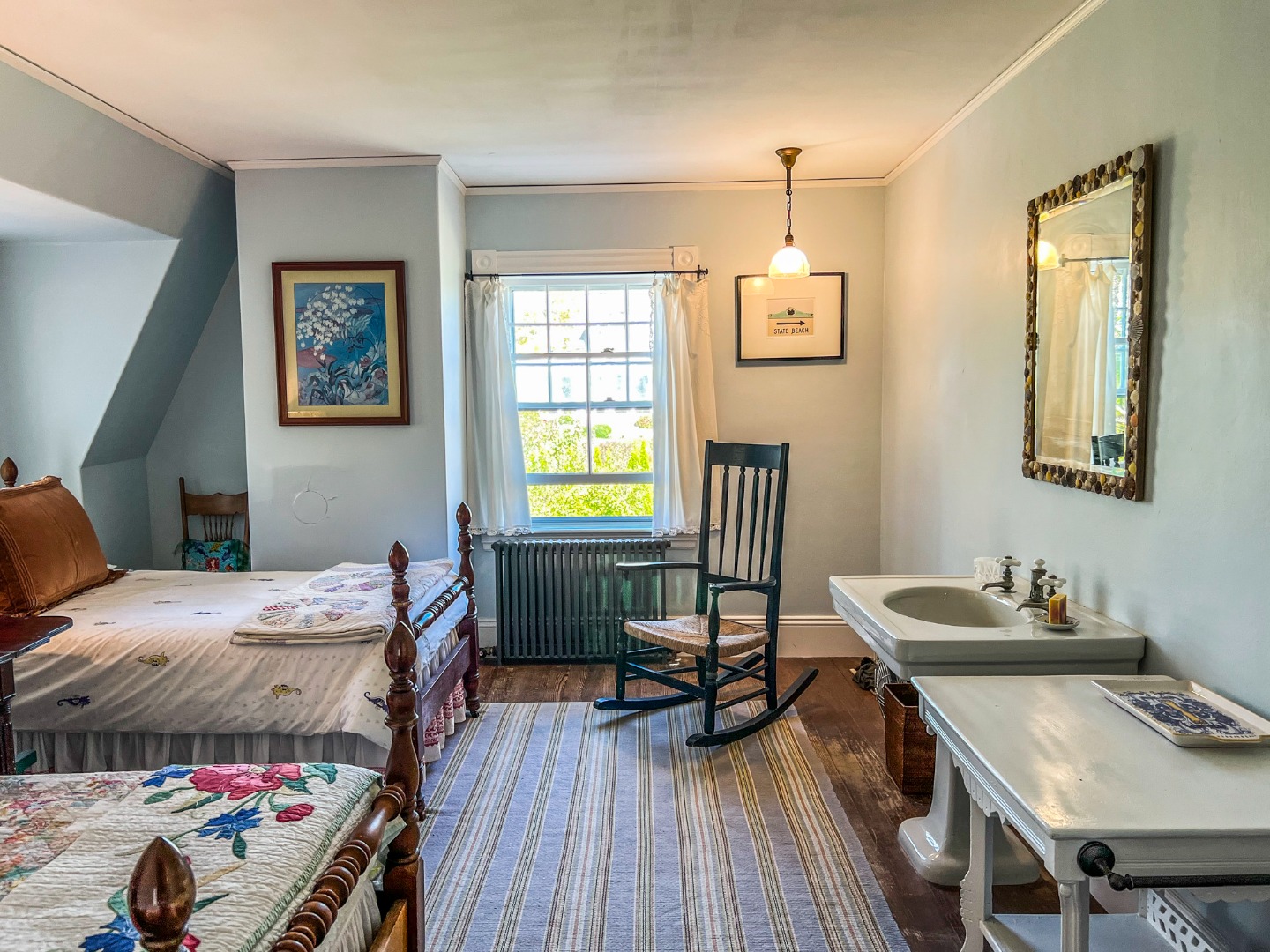 33 Goethals Way Vineyard Haven, MA 02568 - Photo 24 of 34 a bedroom with bed and a wooden floor