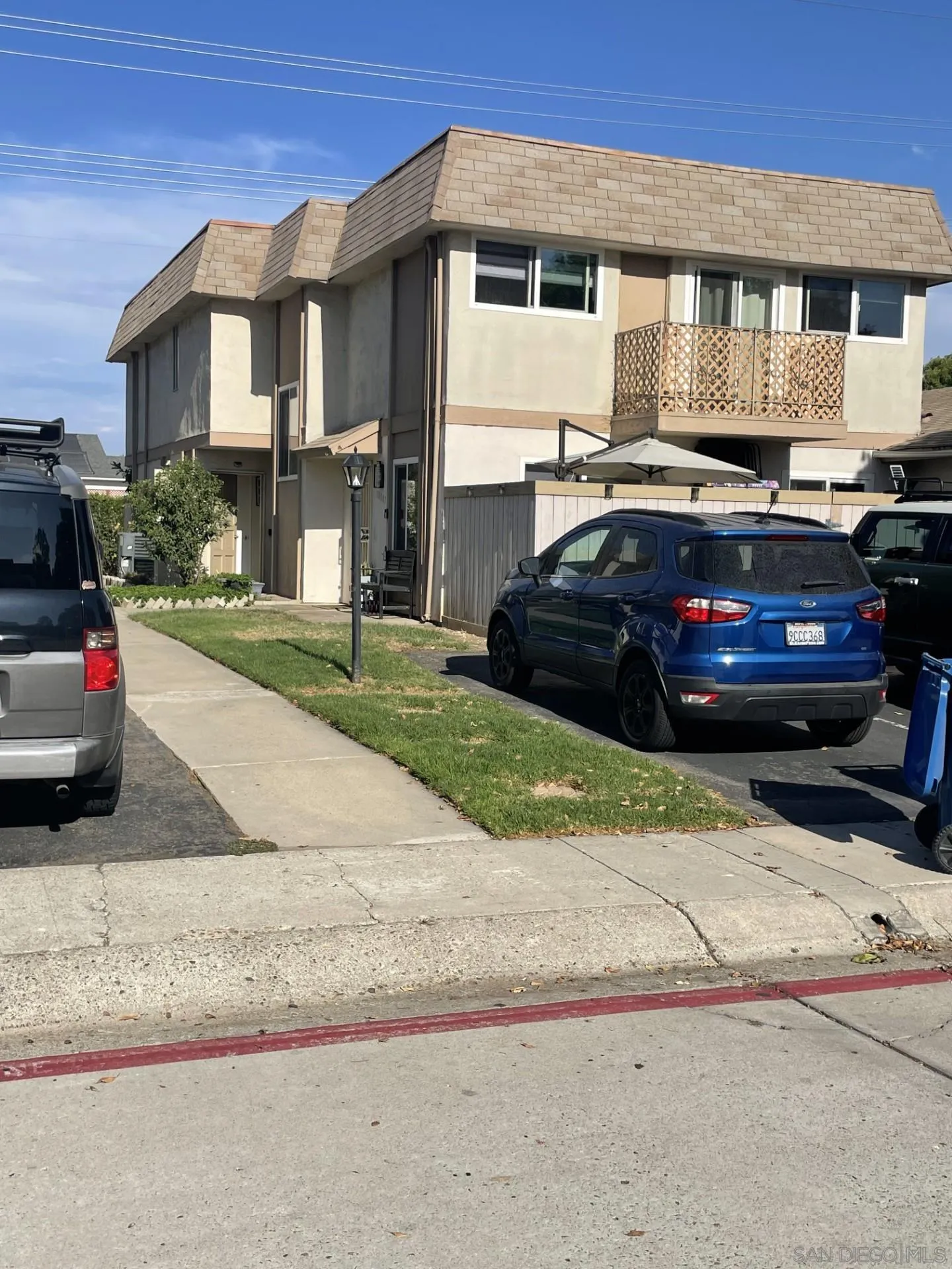 a car parked in front of a house