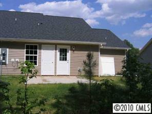 412 Danielle Way Fort Mill, SC 29715 - Photo 2 of 8 a front view of a house with a garden
