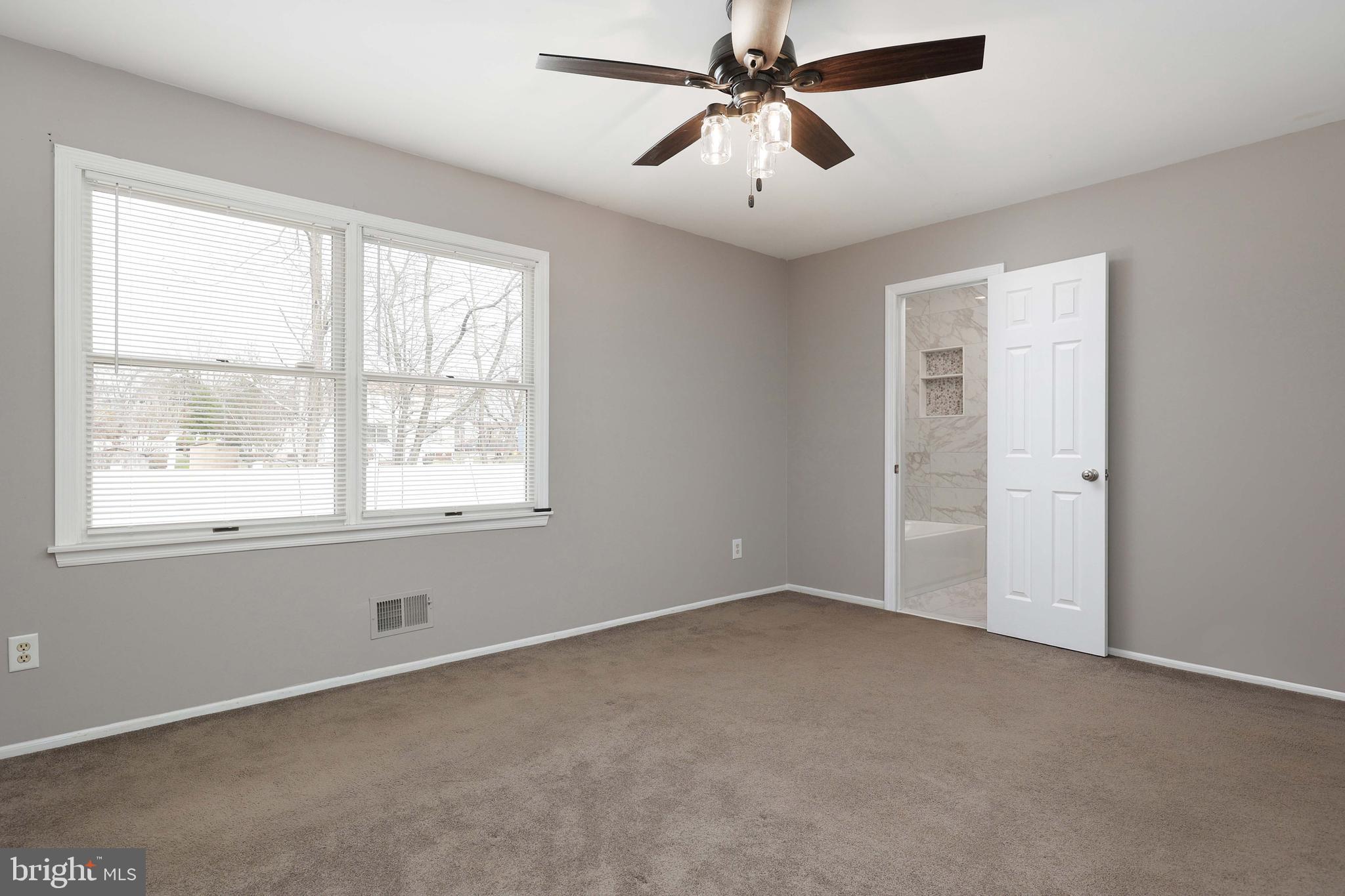285 Manor Boulevard Hamilton, NJ 08620 - Photo 20 of 35 an empty room with windows and fan
