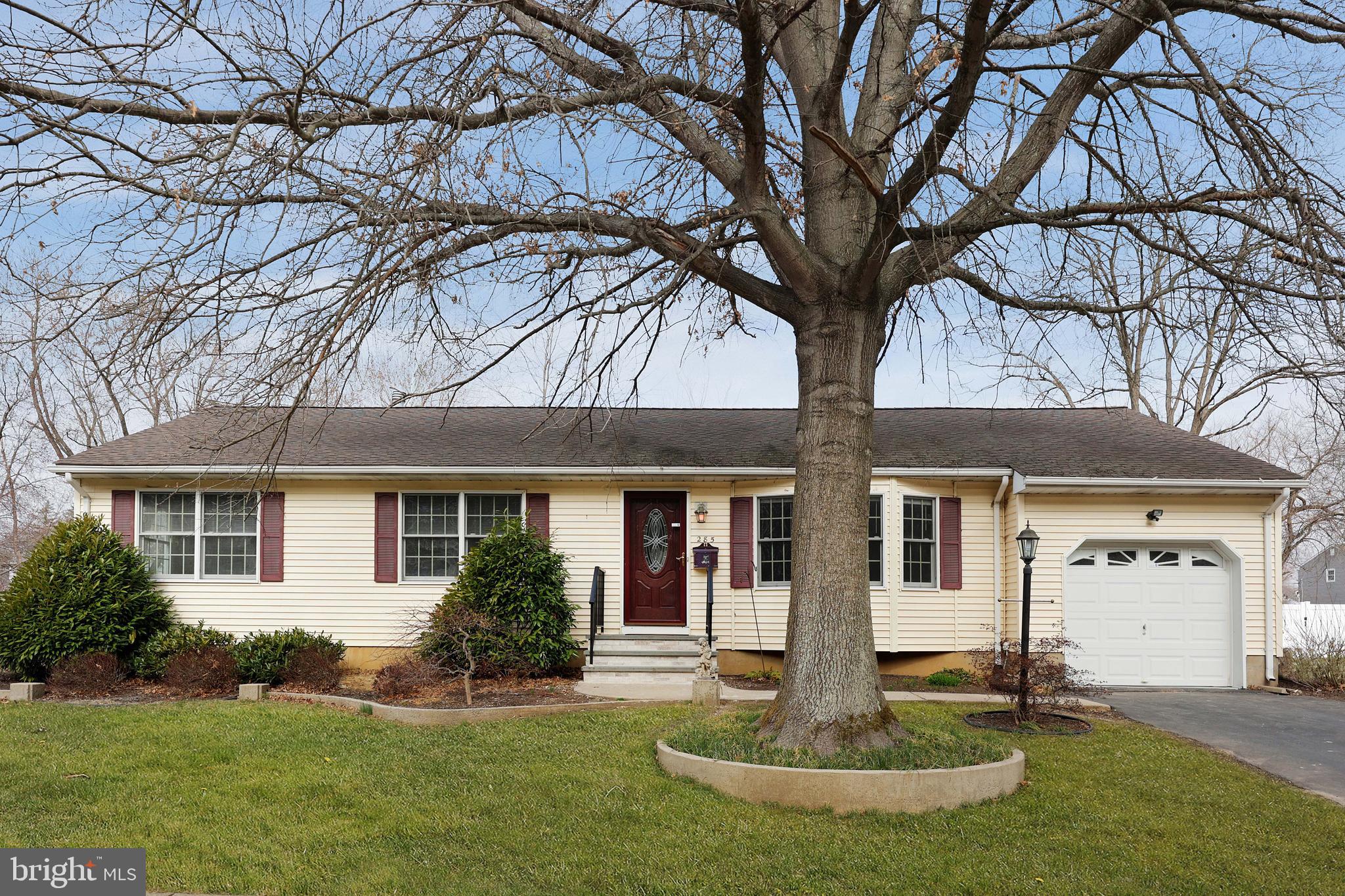 285 Manor Boulevard Hamilton, NJ 08620 - Photo 2 of 35 a front view of house with yard and green space