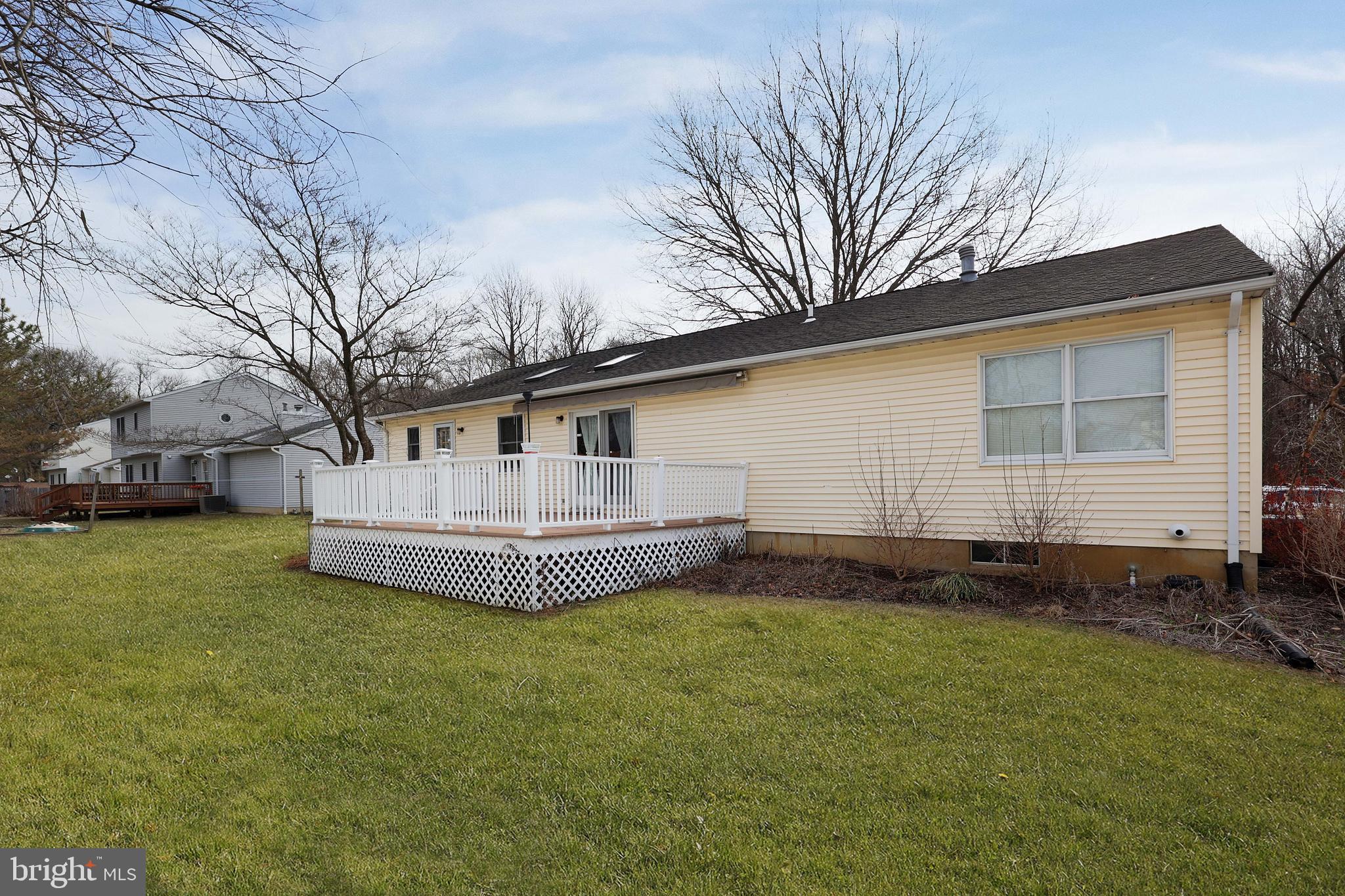 285 Manor Boulevard Hamilton, NJ 08620 - Photo 30 of 35 a view of a house with a yard and sitting area