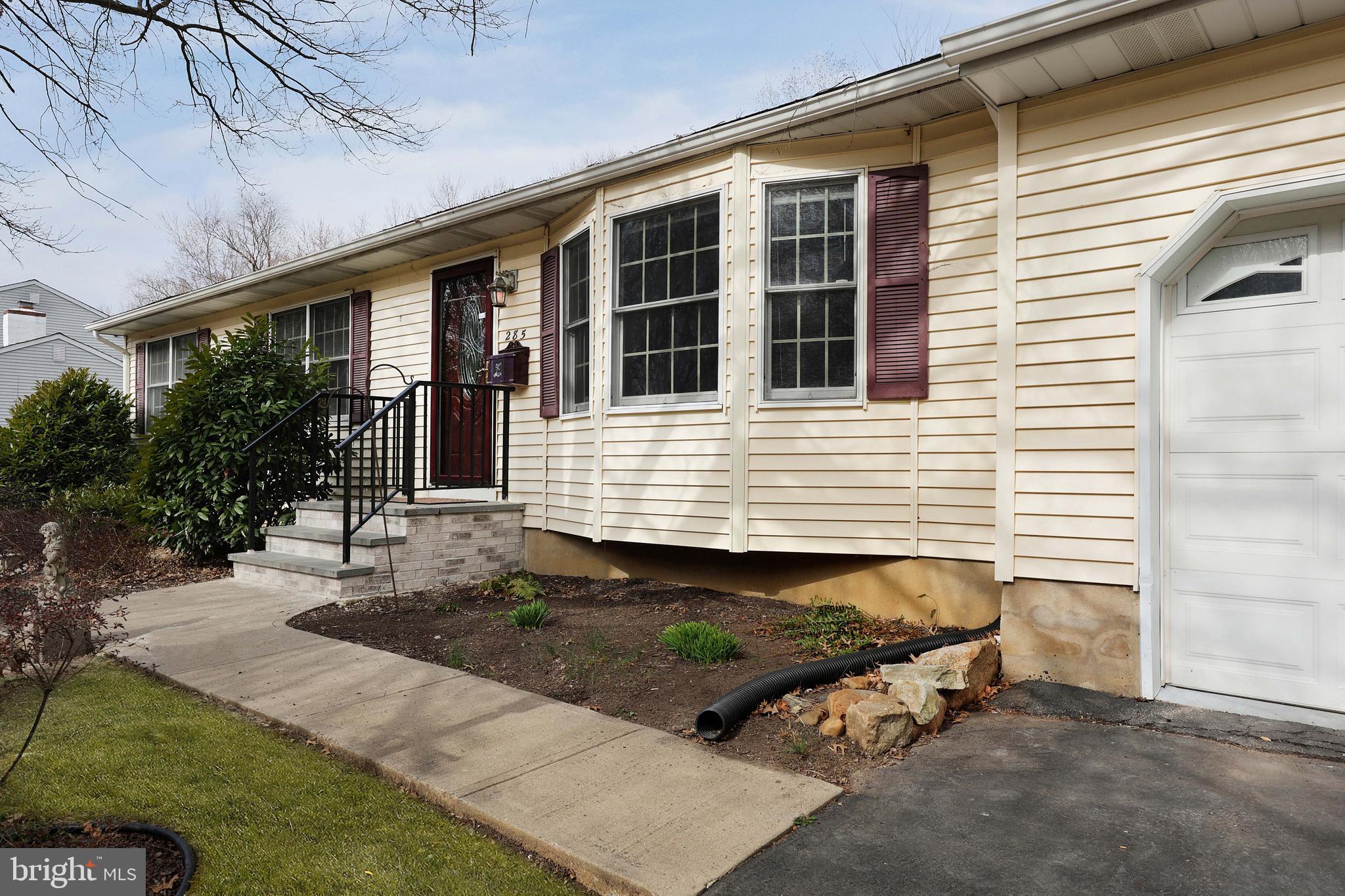 285 Manor Boulevard Hamilton, NJ 08620 - Photo 3 of 35 front view of a house with a yard