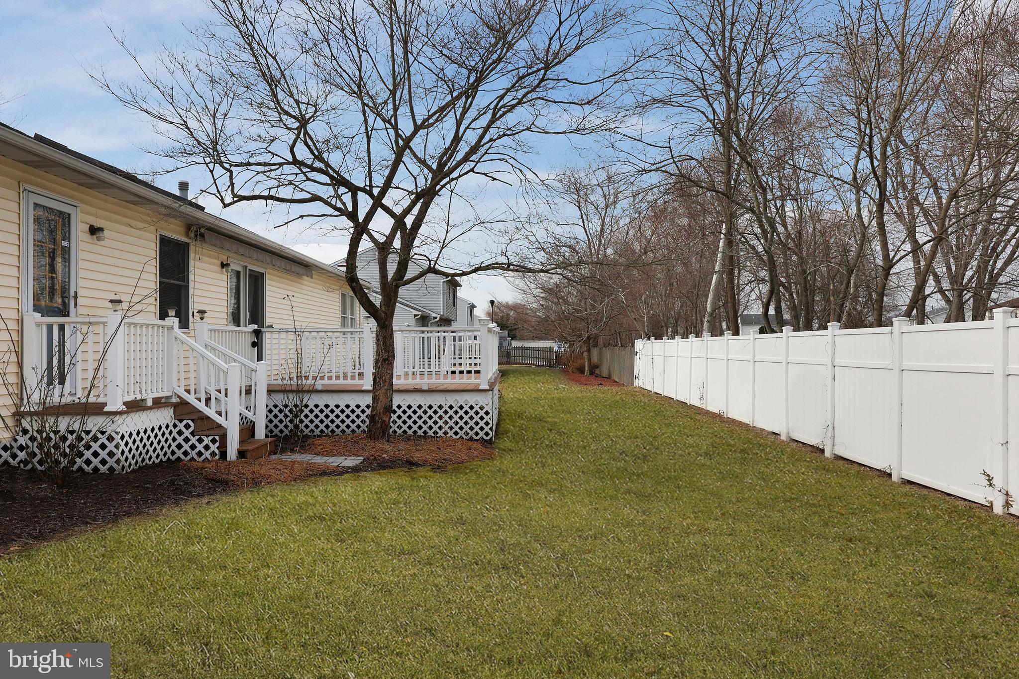 285 Manor Boulevard Hamilton, NJ 08620 - Photo 33 of 35 a front view of a house with a garden