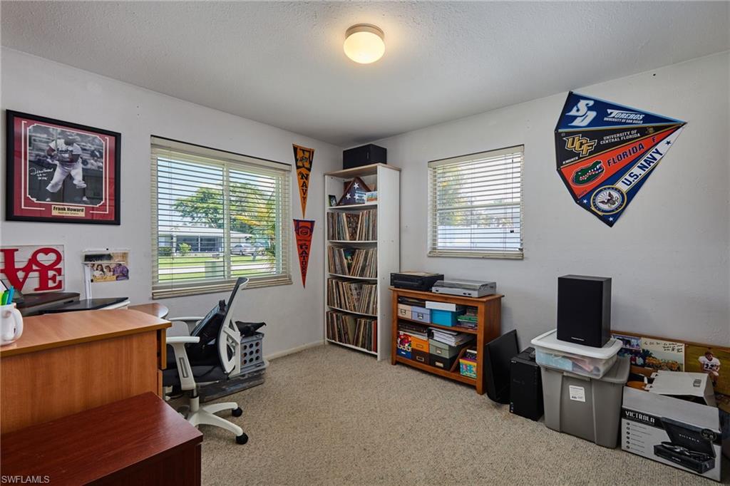 1660 South Hermitage Road Fort Myers, FL 33919 - Photo 17 of 21 a view of a workspace with furniture and a window