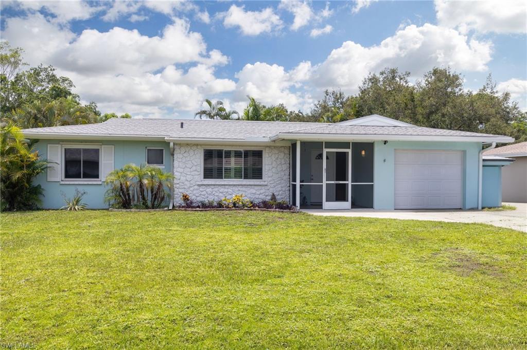 1660 South Hermitage Road Fort Myers, FL 33919 - Photo 5 of 21 a view of a house with backyard garden and garden