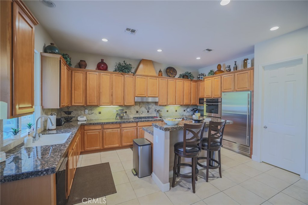 17 Bellisimo Court Rancho Mirage, CA 92270 - Photo 12 of 42 Kitchen, coffee bar with butler pantry on the right