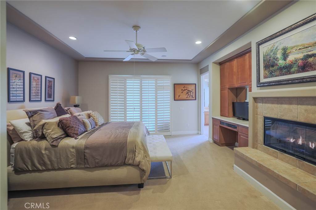 17 Bellisimo Court Rancho Mirage, CA 92270 - Photo 20 of 42 Primary Bedroom with fireplace