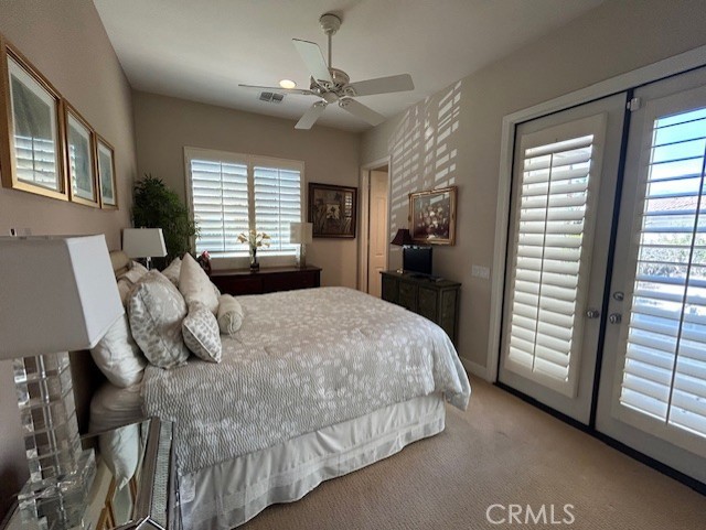 17 Bellisimo Court Rancho Mirage, CA 92270 - Photo 32 of 41 a bed sitting in a spacious bedroom next to a window
